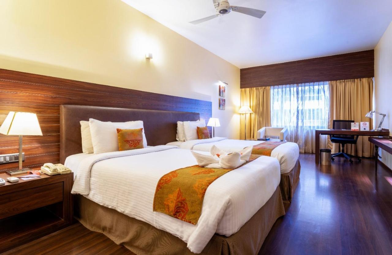 The Woodrose Hotel Bangalore Exterior photo