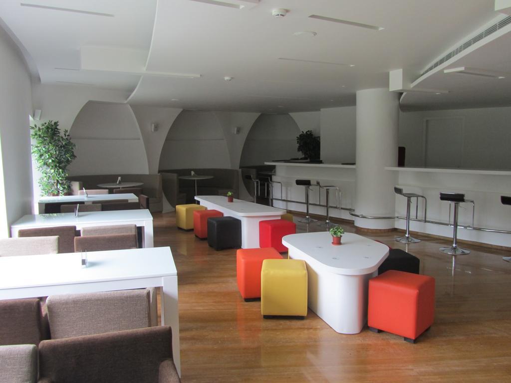 The Woodrose Hotel Bangalore Exterior photo